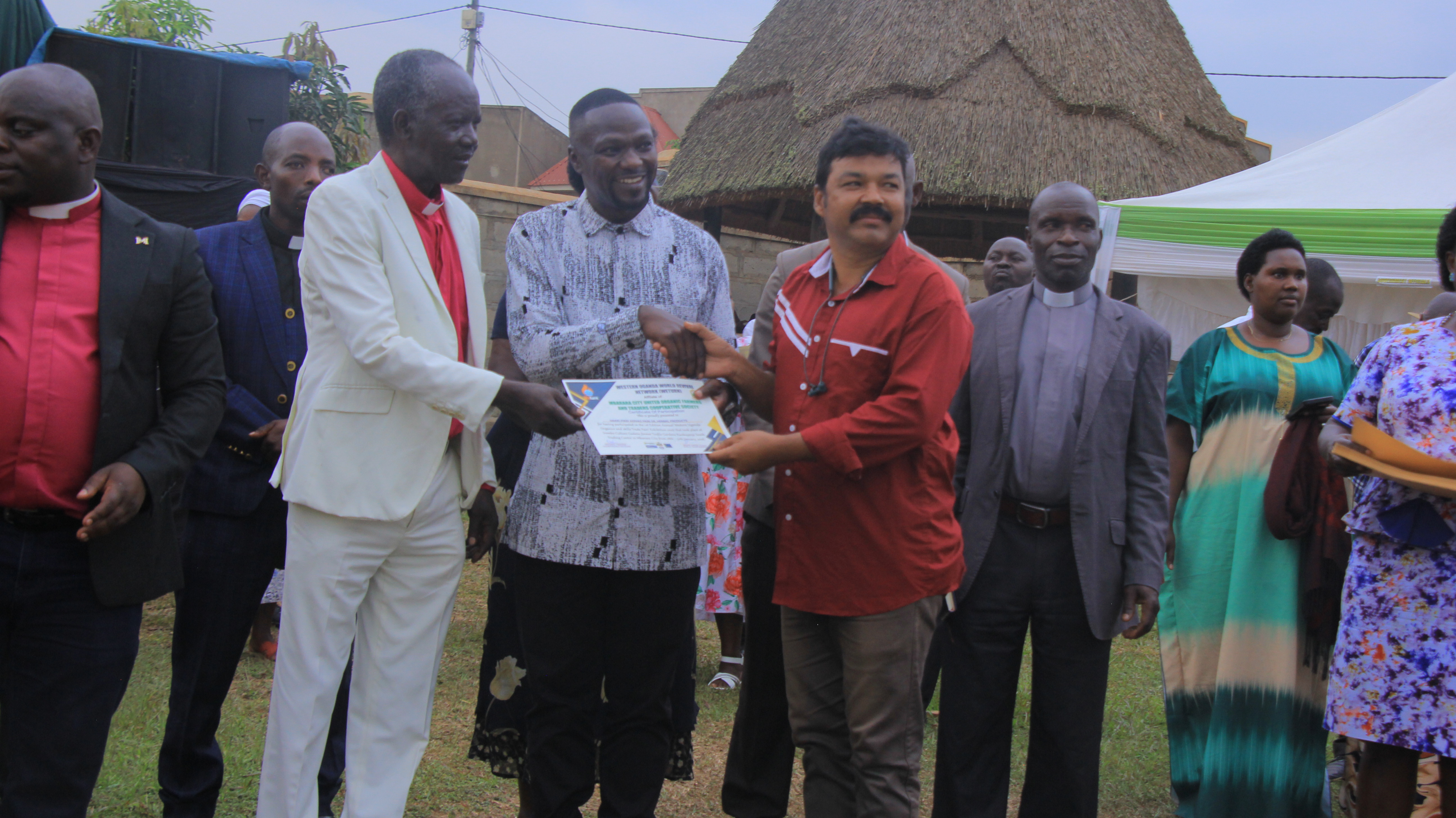 Head of Organics Africa, Bp Joseph Omara & Bp Evangelist Onesmus T. Awarding certific\tes